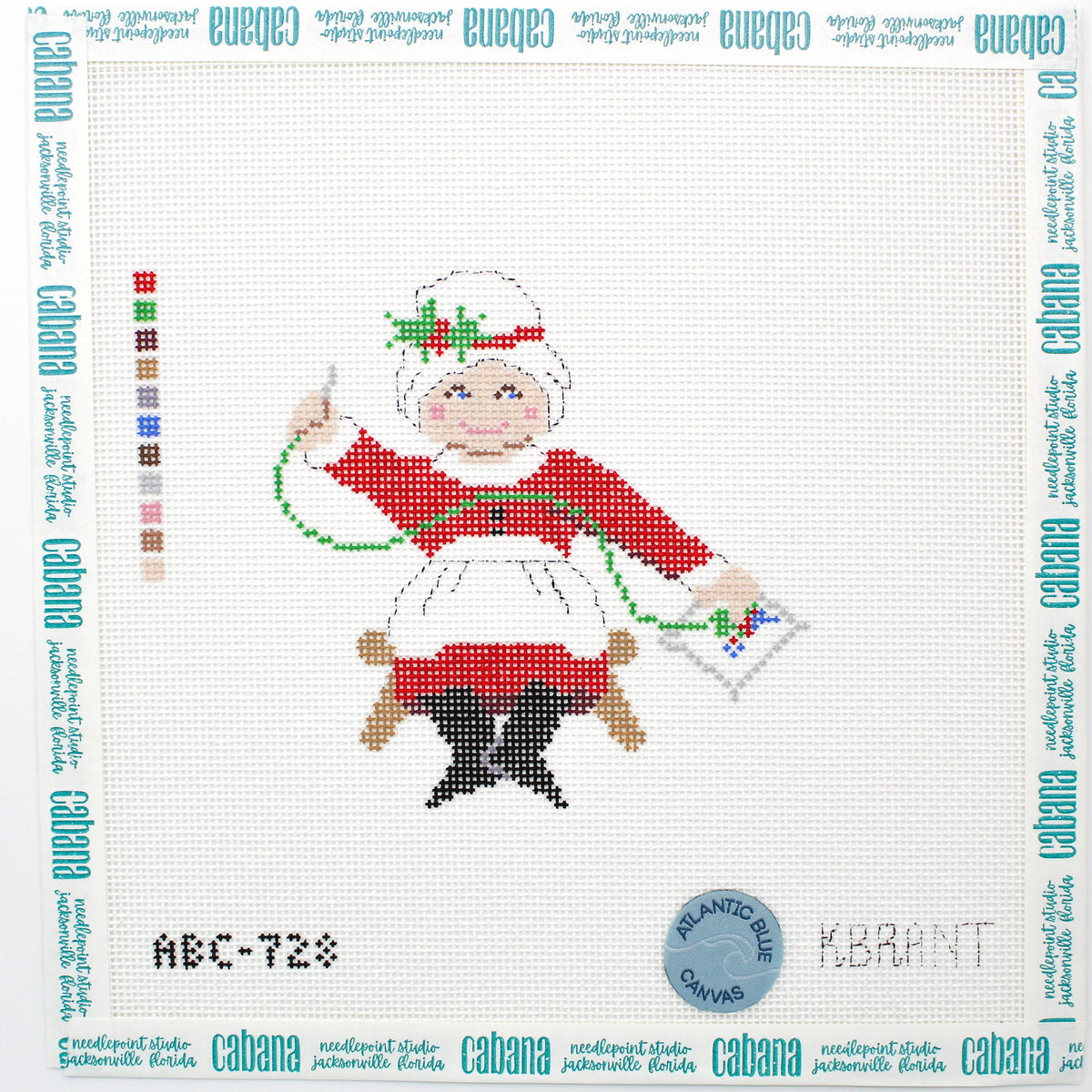 Needlepointing Mrs. Claus